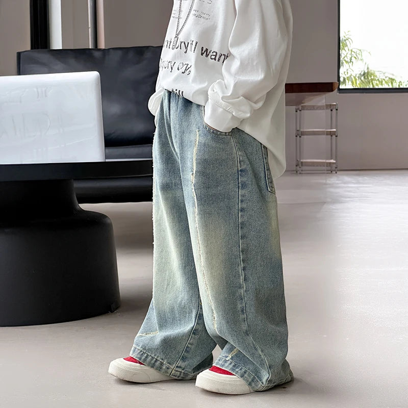 Baby autumn pants boys autumn version of Korean children's wear 2024 new pants in the wear-and-tear jeans trend