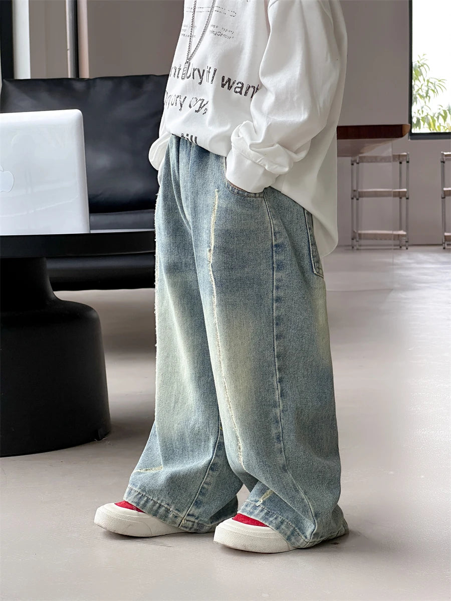 Baby autumn pants boys autumn version of Korean children's wear 2024 new pants in the wear-and-tear jeans trend