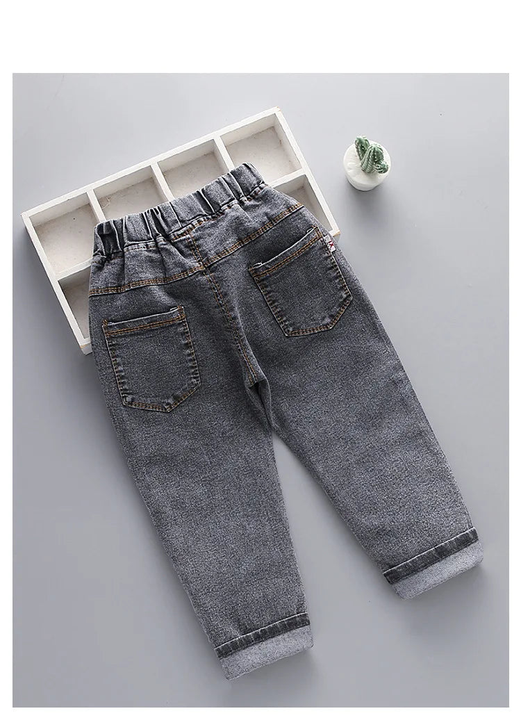 Children's fashion Spring and Autumn Jeans 2024New Boys' Korean Edition Cartoon Elastic Jeans Girls' Versatile Jeans 1-6Y